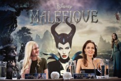 ANGELINA JOLIE ET ELLE FANNING A LA CONF?RENCE DE PRESSE DU FILM "MAL?FIQUE ? PARIS, FRANCE